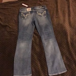 Vigoss jeans tags still on. Slim bootcut size 10